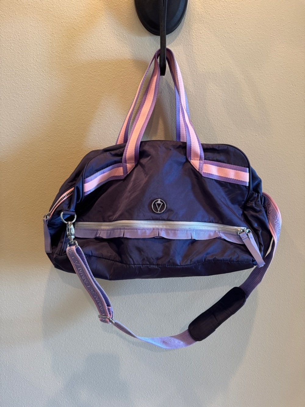 ivivva by Lululemon "Got Game" duffle bag.  dark purple color with pink strap